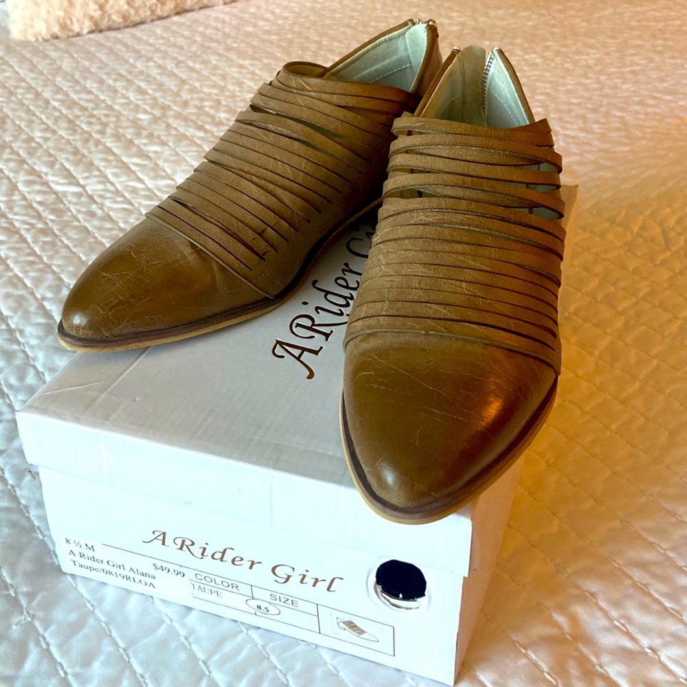 A Rider Girl taupe loafer with zippers on the back, worn twice,  size 8.5